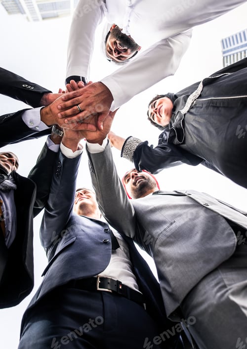 Preview: Mixed business team making agreements on future business plans