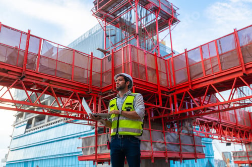 Preview: Portrait of an engineer designing a concrete floor and column structure for a shopping center.