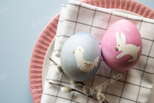 Preview: Easter serving. painted eggs with animal print bunny and bird, willow branches