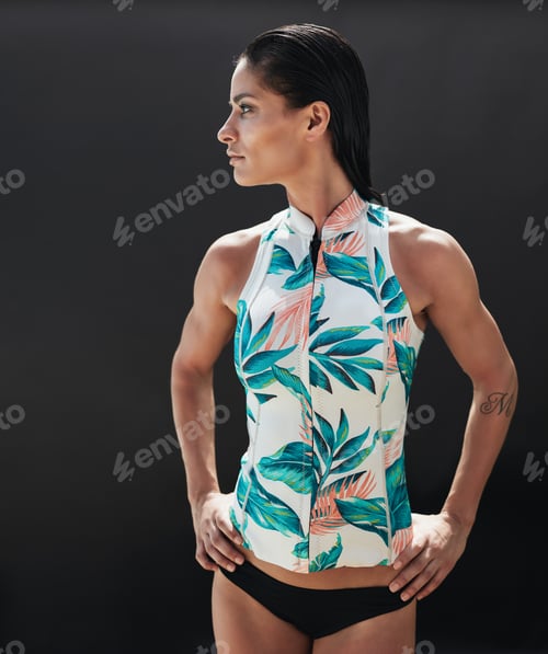 Preview: Attractive female model posing in a sleeveless top and panties