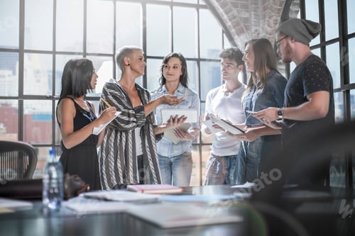 Preview: Colleagues in brainstorming meeting