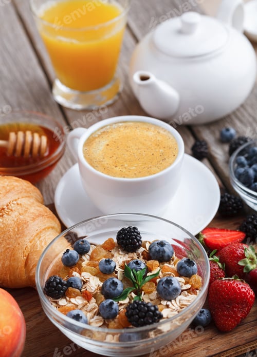 Vista previa: Fresh crusty croissants and muesli for morning meals