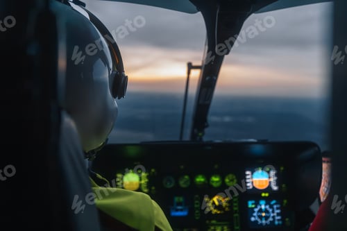 Preview: Helicopter emergency medical service flying at dusk