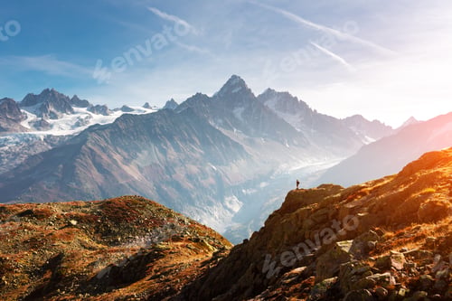 Preview: Amazing view on Monte Bianco mountains range with tourist on a foreground