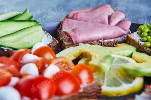 Preview: Assorted open-faced sandwiches, sandwiches with slices of sourdough with various fillings on plate