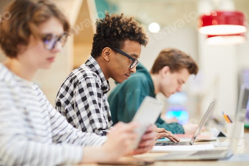 Preview: Busy students in computer class