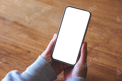 Preview: Top view mockup image of a woman holding mobile phone with blank desktop screen