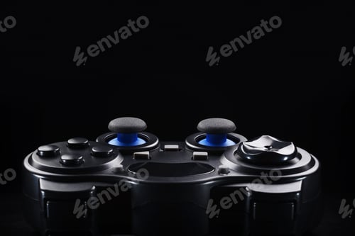 Preview: Black wireless gamepad or joystick on black background.