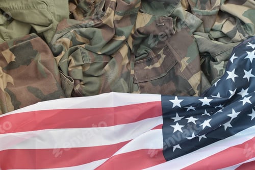 Preview: United States of America flag and folded military uniform jacket