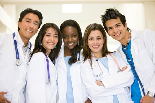 Preview: Doctors In A Hospital Smiling And Looking Friendly
