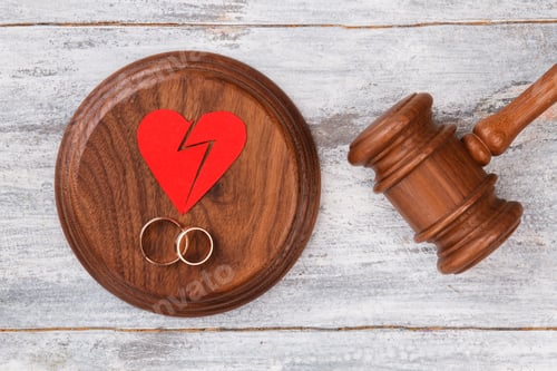Preview: Top view broken heart and gavel.