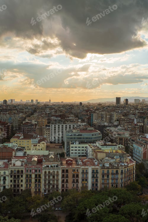 Preview: Spain, Catalonia, Barcelona, Cityscape under cloudy sky