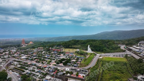 Preview: Aerial view of a serene cemetery landscape in Taiwan with statues and lush greenery