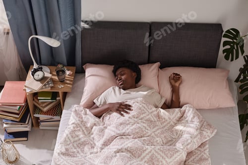 Preview: Woman enjoying her sleeping in the bed