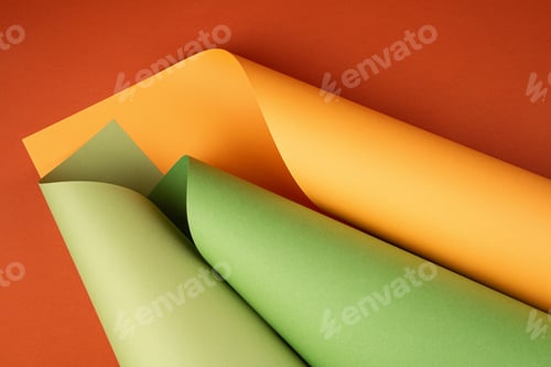 Preview: Abstract backgroud of rolled textured paper sheets of different shades