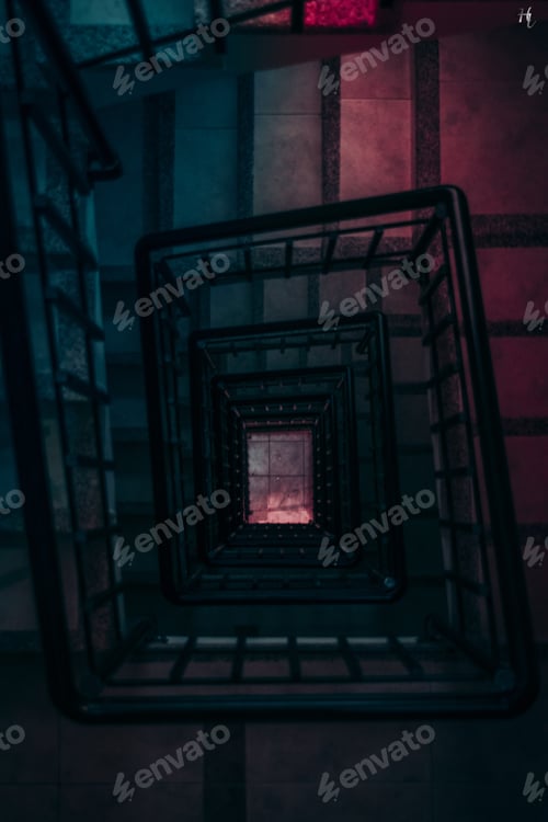 Preview: Vertical high angle shot of a staircase leading to an unknown place