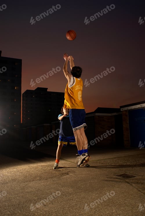 Preview: basketball player jumping and shooting