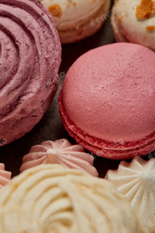 Preview: Delicious pink french macaron with soft zephyr and small pink meringues