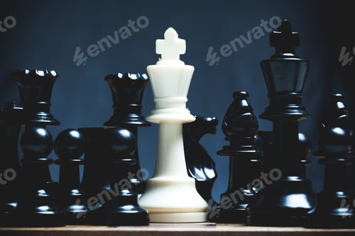 Preview: Chess pieces on a board with a white king standing out among black pieces