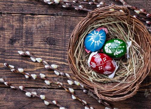 Preview: Easter eggs on a wooden background