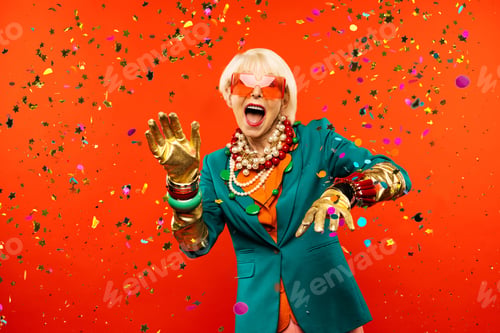 Preview: Cool and stylish senior old woman with fashionable clothes