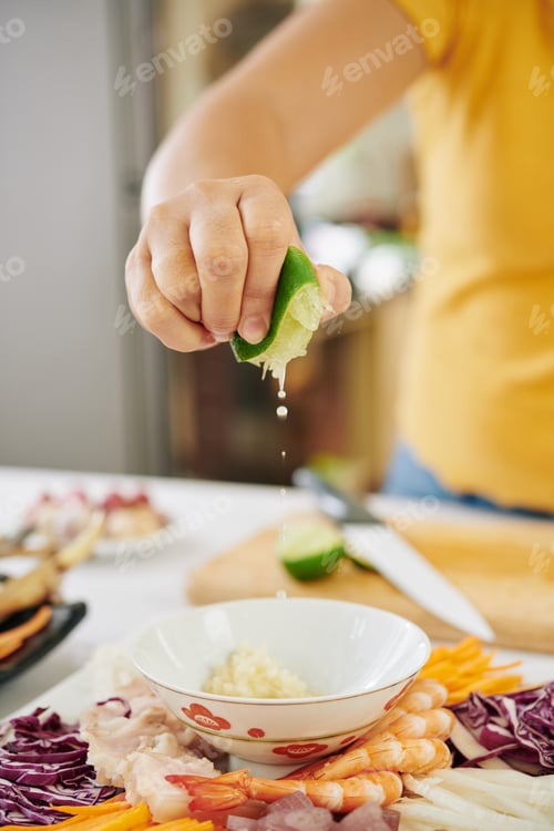 Preview: Woman making dipping sauce