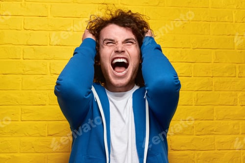Preview: Stressed guy tearing curly hair