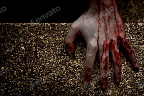 Preview: Hand zombie death with blood touching stair on nightmare darkness background