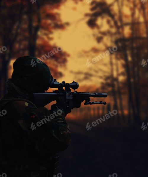 Preview: Silhouette of a military soldier with weapons at sunset