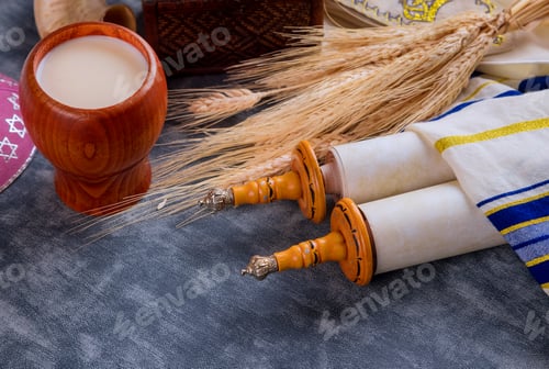 Preview: Torah and tallis in the Traditional celebration season Jewish holiday Shavuot on kosher dairy food