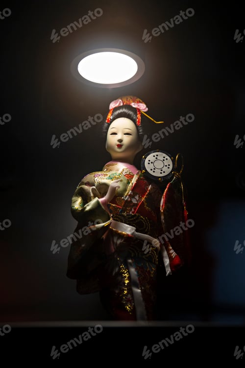 Preview: Dramatic Doll Under Spotlight in the Dark