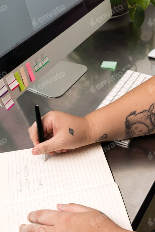 Preview: Woman hand with forearm tattoo writing