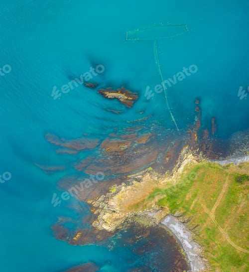 Preview: Sea sunrise at rocky beach