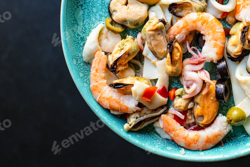 Preview: Seafood Salad Or Appetizer Shrimp, Mussels, Squid And Other Ingredients Top View Copy Space For