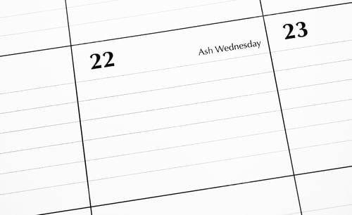 Preview: Overhead view of a date Ash Wednesday on a desktop calendar
