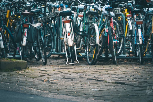 Preview: Closeup shot of bicycles parked outdoors