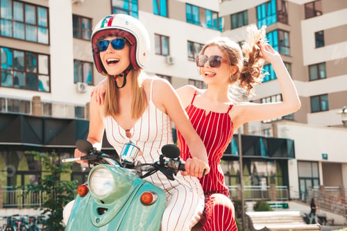 Preview: Two young beautiful woman posing outdoors
