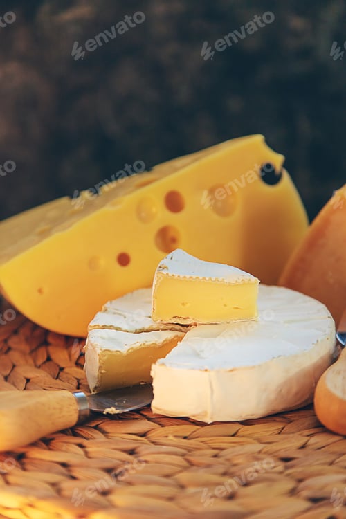 Preview: Cheese is on the table. Selective focus.