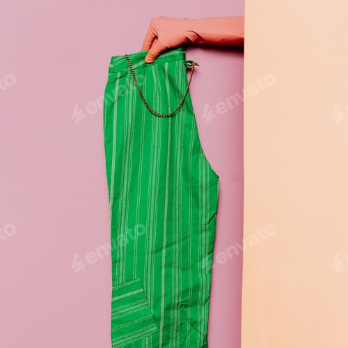 Preview: Stylish clothes. Summer green pants. Strip print trend wardrobe