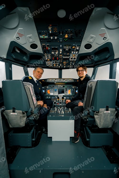 Preview: airplane cockpit pilot and young student boy smiling after training on flight simulator