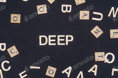 Preview: DEEP word written on dark paper background. DEEP text for your concepts