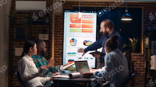 Preview: Company analyst explaining statistics graphs visualization in business meeting