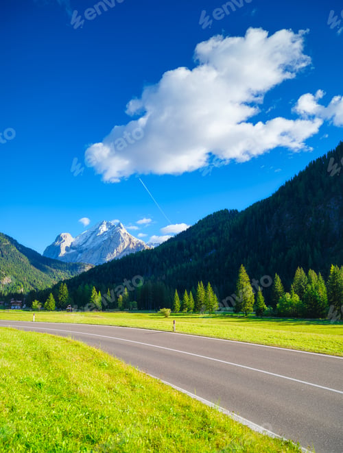 Preview: View of the road with turns in the mountain valley. The Dolomite Alps, Italy.