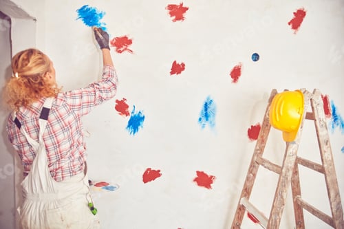 Preview: Working Woman Plastering / Painting Walls Inside The House.