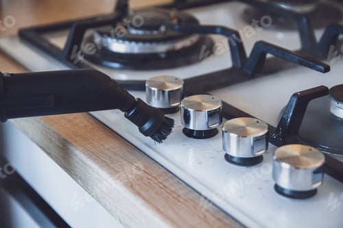 Preview: Glass ceramic stove cleaning with a steam cleaner, house disinfe