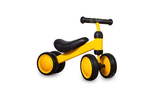 Preview: Children's yellow tricycle isolated on white background. Children's leisure time.