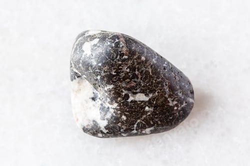 Preview: sample of tumbled trachybasalt mineral on white