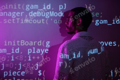 Preview: Examining Computer Code Projected on Wall