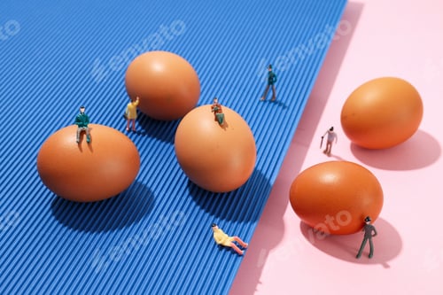 Preview: Miniature people and eggs on two tone background