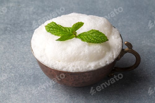 Preview: Glass cup of Turkish traditional drink ayran , kefir or buttermilk made from yogurt, healthy food